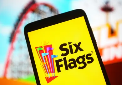 In this photo illustration the Six Flags Entertainment