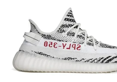 Image Via <a href='https://yeezysupply.com/products/adidas-yeezy-boost-350-v2-zebra-white-black' rel="nofollow noopener" target='_blank'>yeezysupply</a>