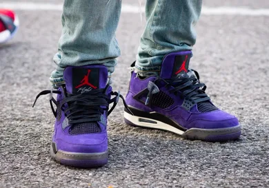 Image via <a href='http://www.nicekicks.com/travis-scott-x-air-jordan-4-purple-suede-closer-look/' rel="nofollow noopener" target='_blank'>Gabe Oshin/Nice Kicks</a>