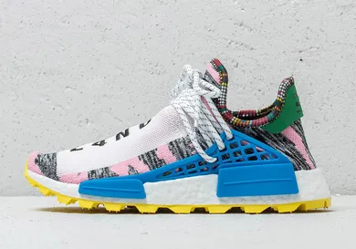 Image Via <a href='https://sneakernews.com/2018/08/14/where-to-buy-pharrell-adidas-nmd-solar-hu-collection/' rel="nofollow noopener" target='_blank'>SneakerNews</a>
