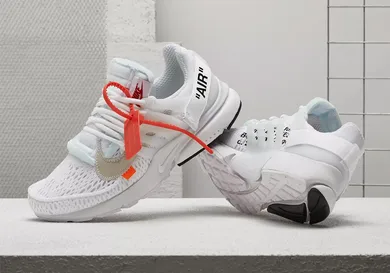 Image Via <a href='https://sneakernews.com/2018/07/27/where-to-buy-off-white-nike-presto-white-polar-opposites/' rel="nofollow noopener" target='_blank'>SneakerNews</a>