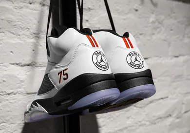 Image Via <a href='https://air.jordan.com/card/the-paris-saint-germain-air-jordan-v-friends-family/?utm_source=Twitter&utm_medium=Social&utm_campaign=the+paris+saint+germain+air+jordan+v+friends+family&utm_content=Twitter+Link+Card' rel="nofollow noopener" target='_blank'>AirJordan</a>