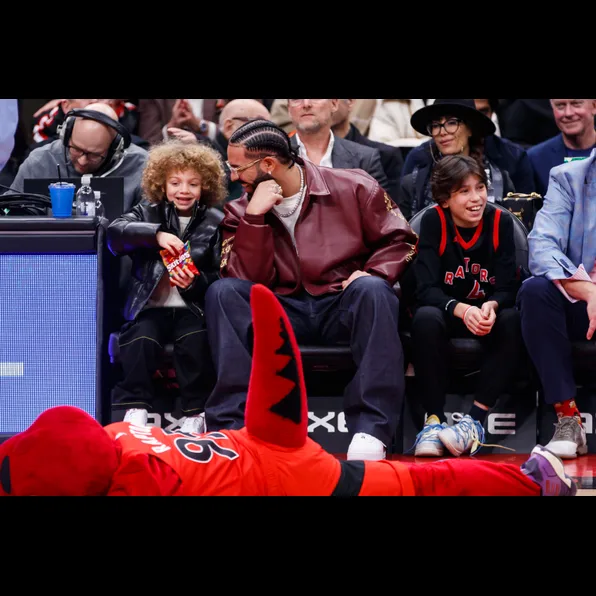 Drake Rapper At Raptor Game Drake & Adonis Have A Blast At The Raptors Game