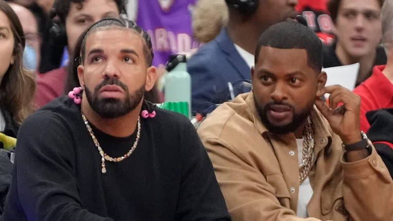 Drake Center Drake's OVO Crew Watches Kendrick Lamar Super Bowl In Australia During Tour