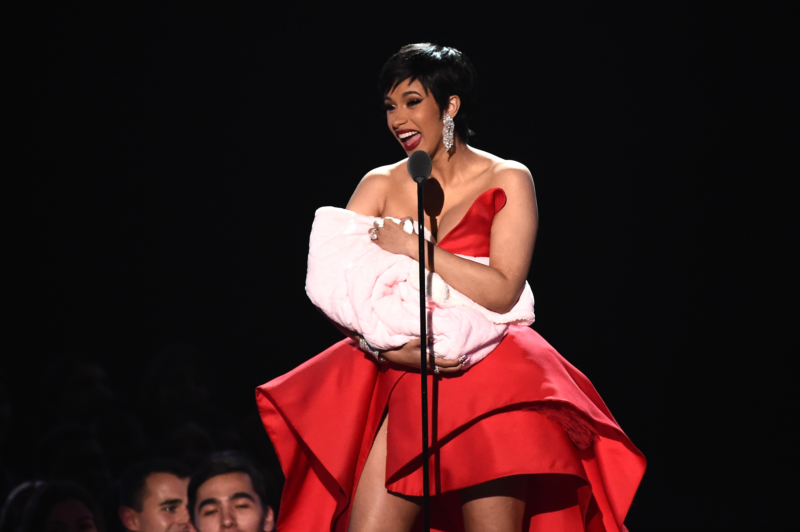 Cardi B opens up about getting her breasts redone