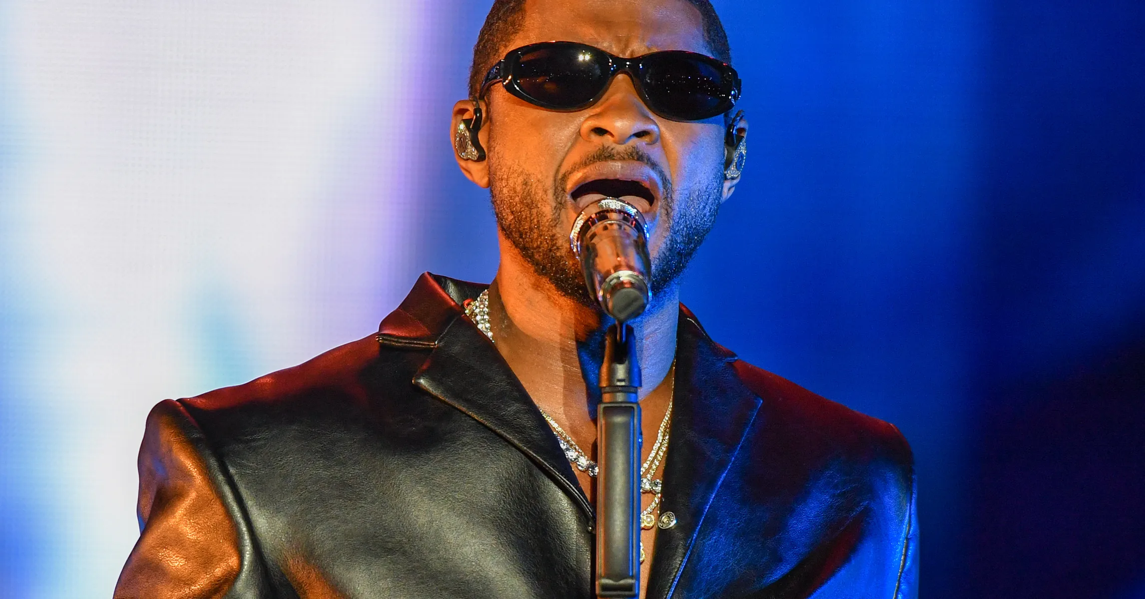 Usher Performs At Lovers & Friends After Chris Brown Fight