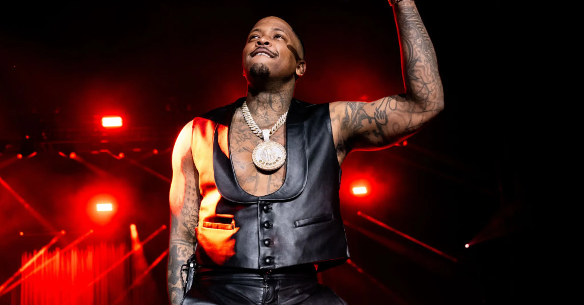 Y Rapper YG Volunteers At Compton Food Drive Under Armed Guard