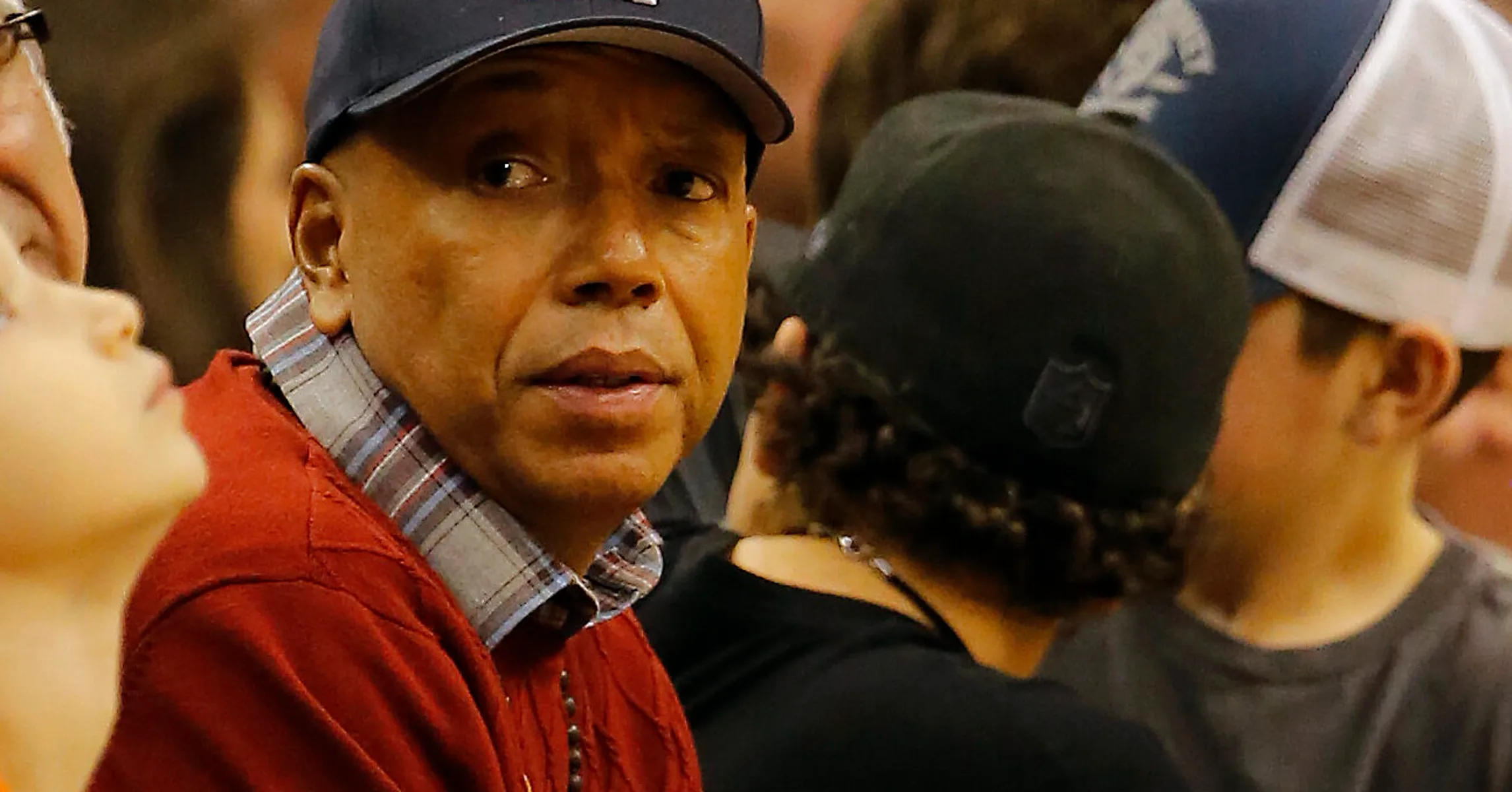 Russell Simmons Uses “Hotel Lobby” AI Trend Amid Kimora Lee Tension