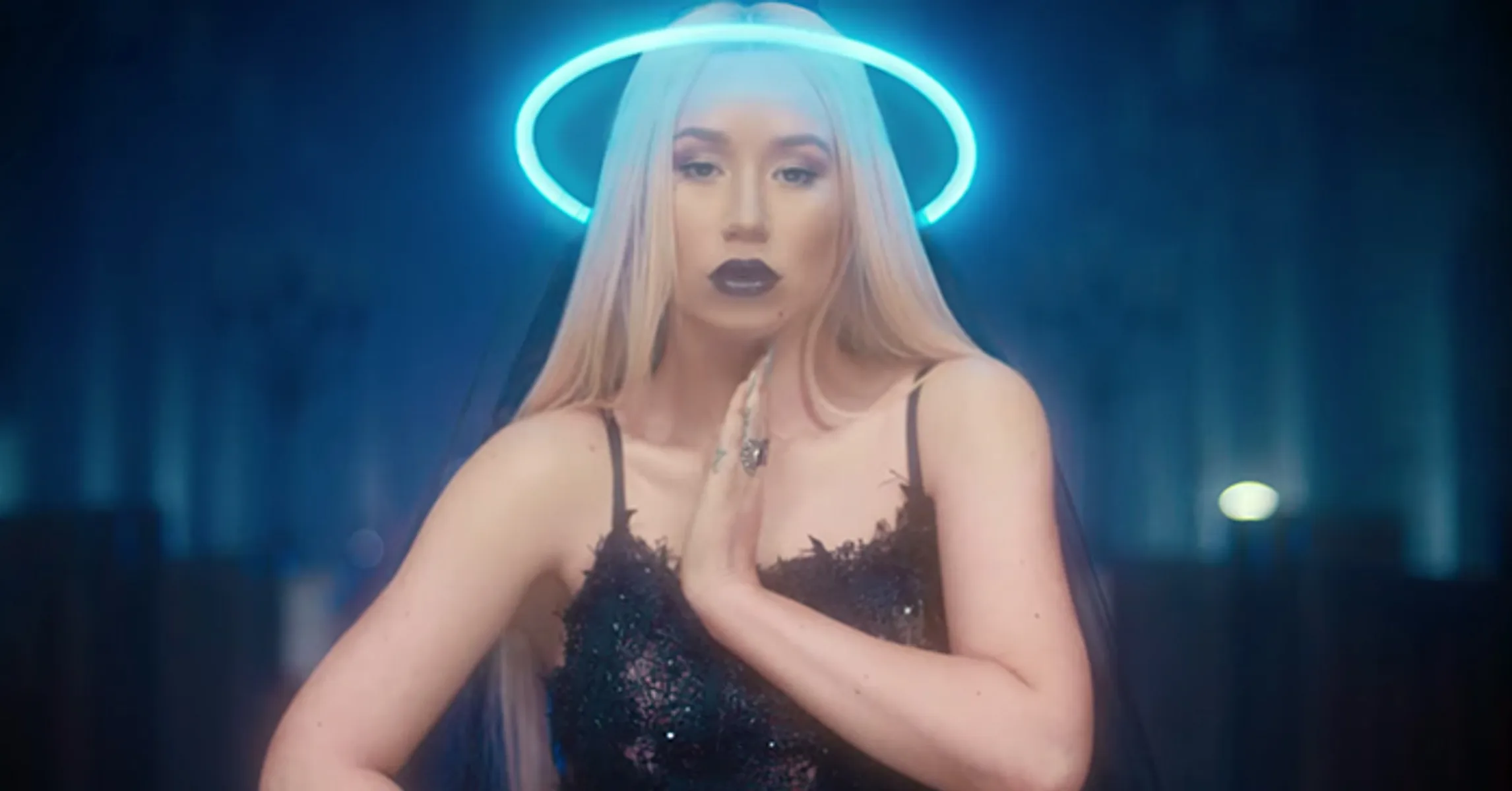 Iggy Azalea Takes Over A Neon-Filled Church In New Video For 