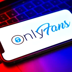 In this photo illustration, an OnlyFans logo seen displayed