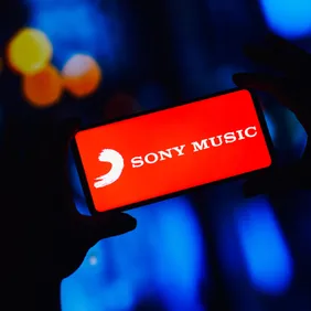 In this photo illustration, the Sony Music Group logo is