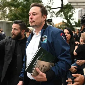 Elon Musk leaves at the Turkish House