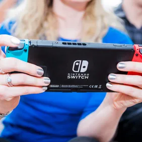 People Playing A Nintendo Switch