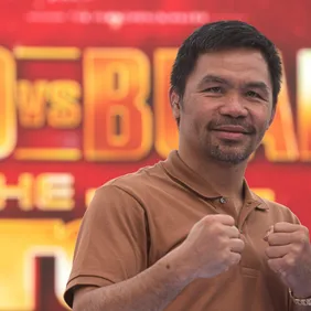 Manny Pacquiao, a Filipino boxer poses for a photo to the