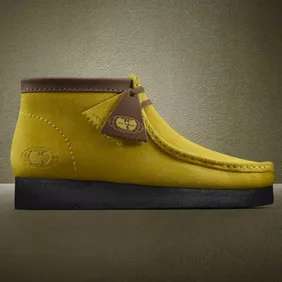Image Via <a href='https://solecollector.com/news/2018/11/wu-wear-clarks-wallabees-25th-anniversary-release-date' rel="nofollow noopener" target='_blank'>Solecollector</a>