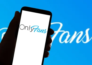 In this photo illustration, the Onlyfans app logo is on the