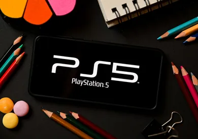 In this photo illustration a PlayStation 5 logo seen