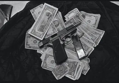Gun and Money Collected by Gang Squad