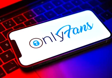 In this photo illustration, an OnlyFans logo seen displayed