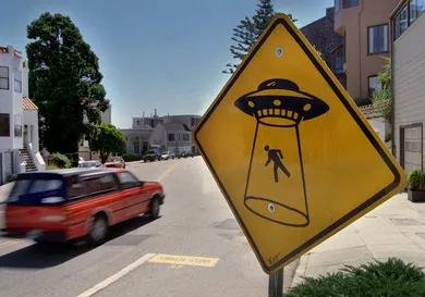 UFO/C/30AUG98/MN/MAC  =  STREET SIGNS FOR SAFETY OF PEDESTRIANS /  On Roosevelt Way at Loma Vista in San Francisco, the Dept. of Public Works has erected a yellow warning sign at the curve of the road. Originally placed it contained no text or symbols but