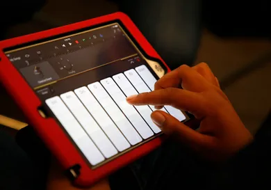 A student uses the GarageBand application on a iPad to make music during a "Girls On The Mic" class at the Women's Audio Mission studio on Thursday, Sept. 14, 2017, in Oakland, Calif.  Women's Audio Mission is a San Francisco-based non-profit whose missio