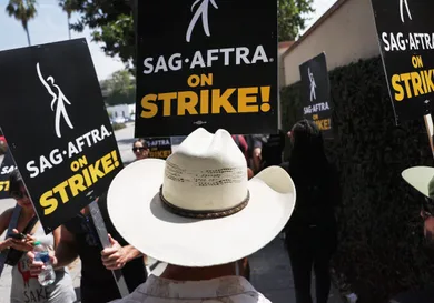 SAG-AFTRA Members Walk The Picket Lines Amid Actors' Strike