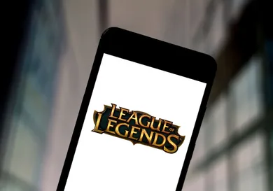 In this photo illustration a League of Legends logo seen