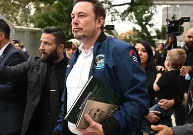 Elon Musk leaves at the Turkish House