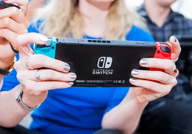 People Playing A Nintendo Switch