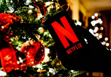 In this photo illustration the Netflix logo seen displayed