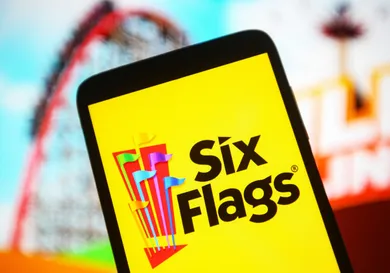 In this photo illustration the Six Flags Entertainment