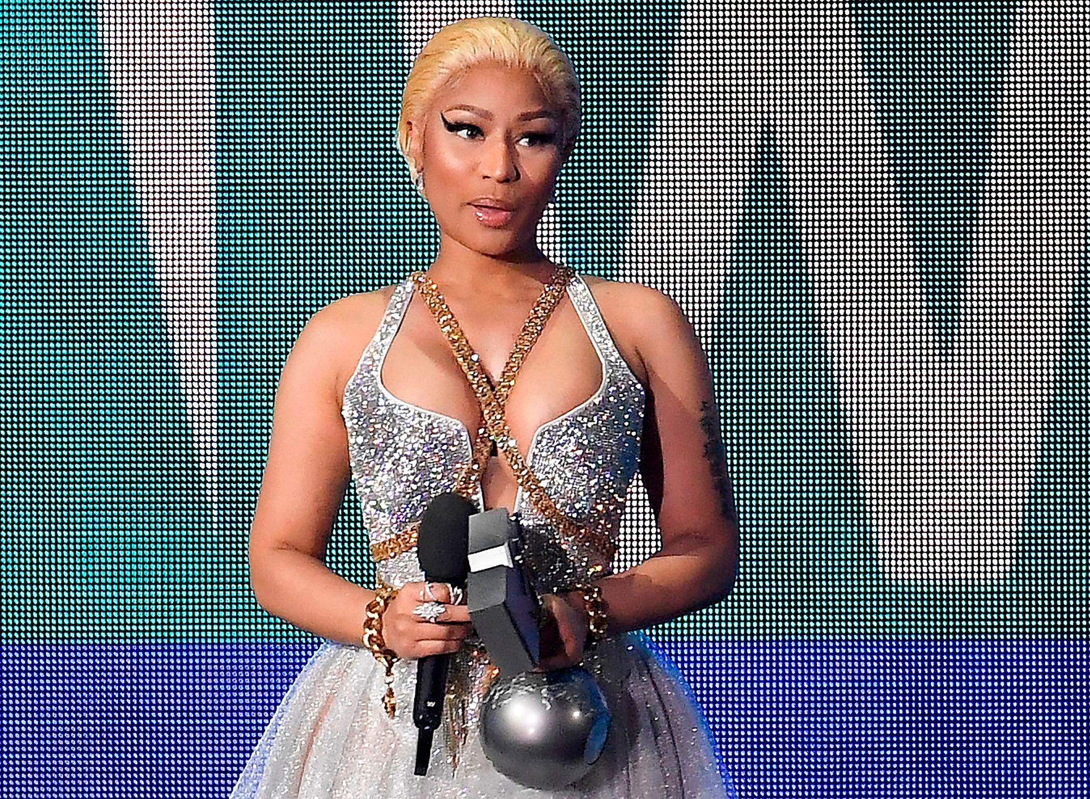 Nicki Minaj Claps Back At Trolls Dissing Her Driving Skills: "That's A Lie  From The PITS Of Hell"