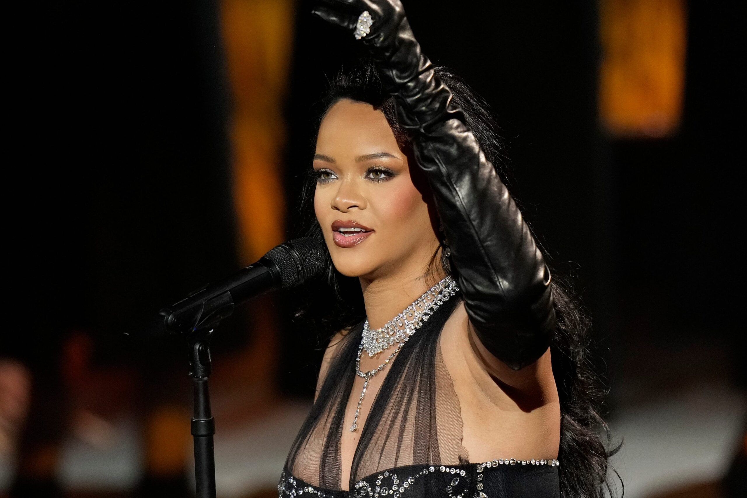 Rihanna Promotes New Fenty Hair Product In Sleek Lingerie