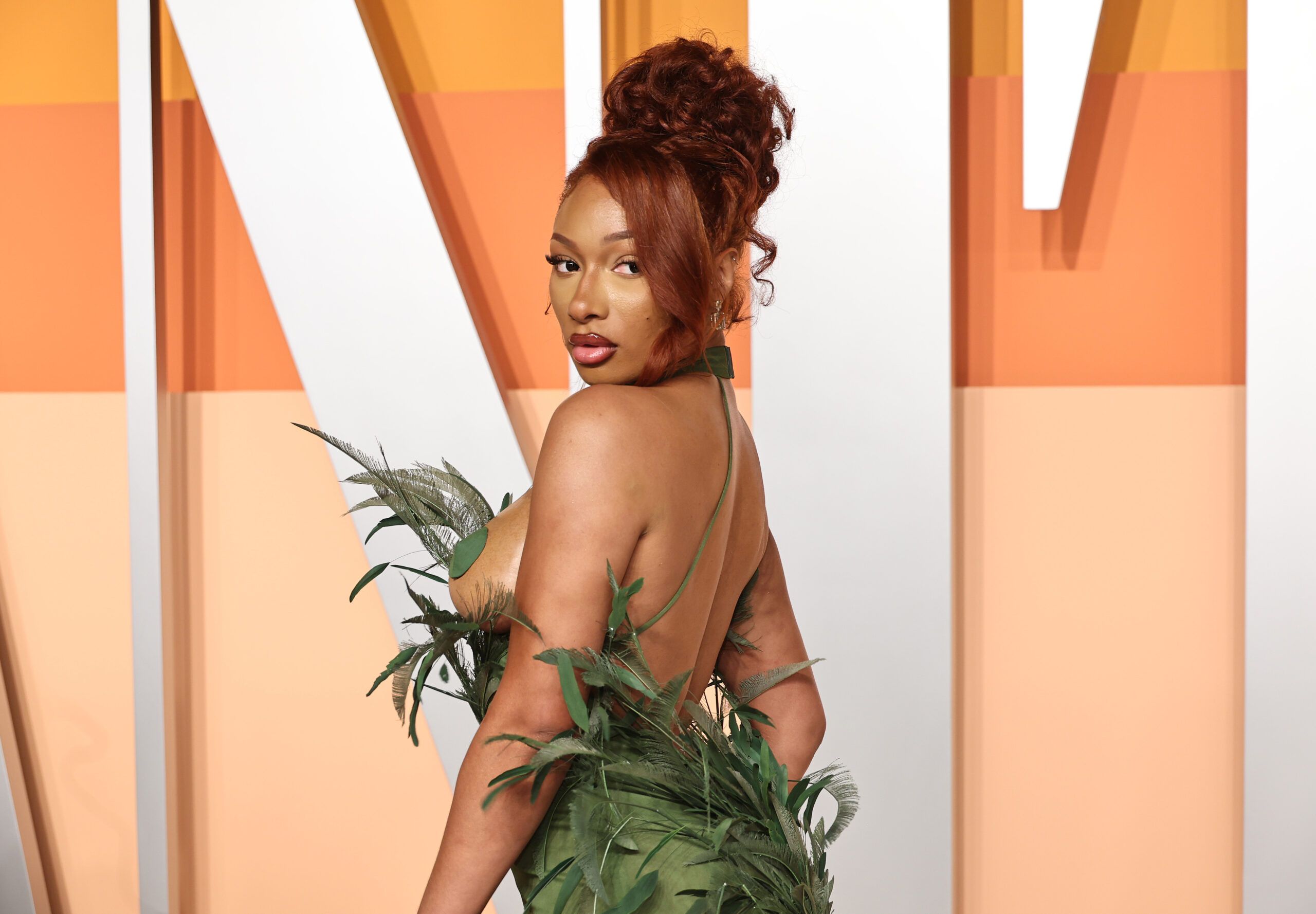 megan thee stallion green dress Stuns in at Vanity Fair Oscars Megan Thee Stallion Green Dress