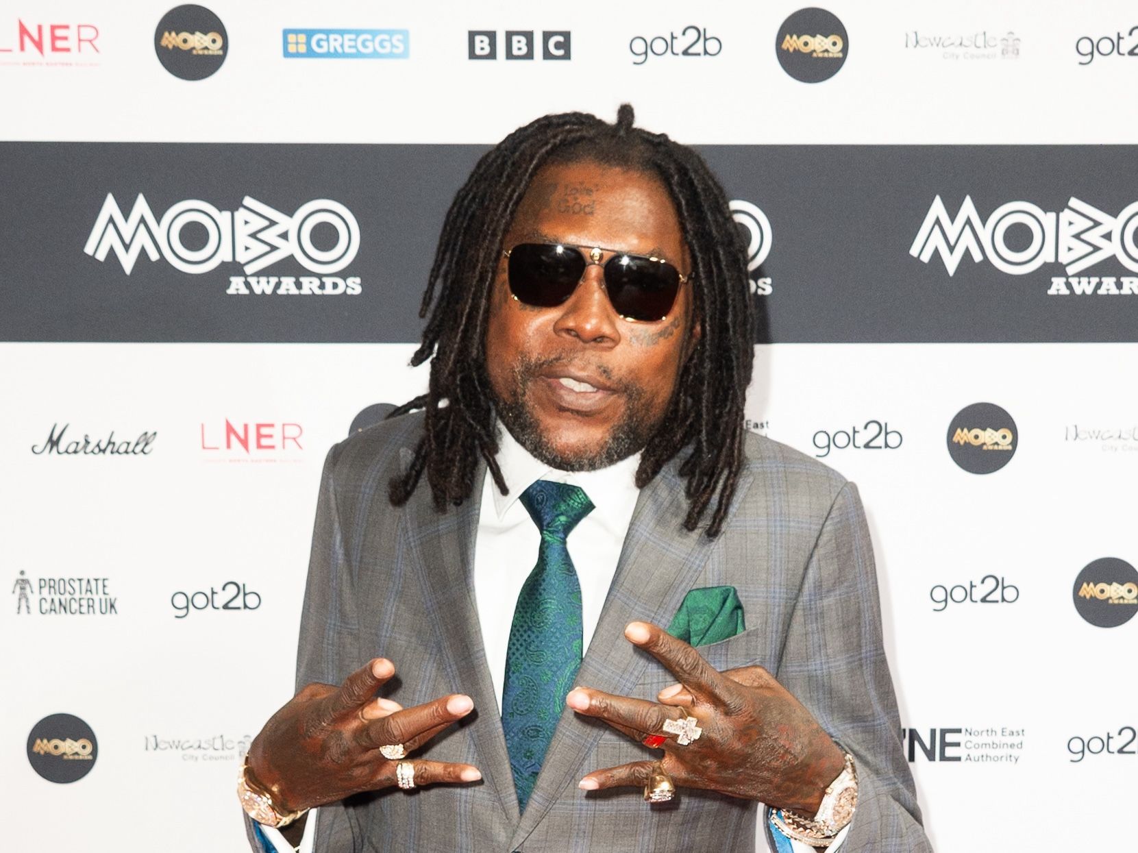 Vybz Kartel Sports Custom Drake-Gifted OVO Chain During Stream